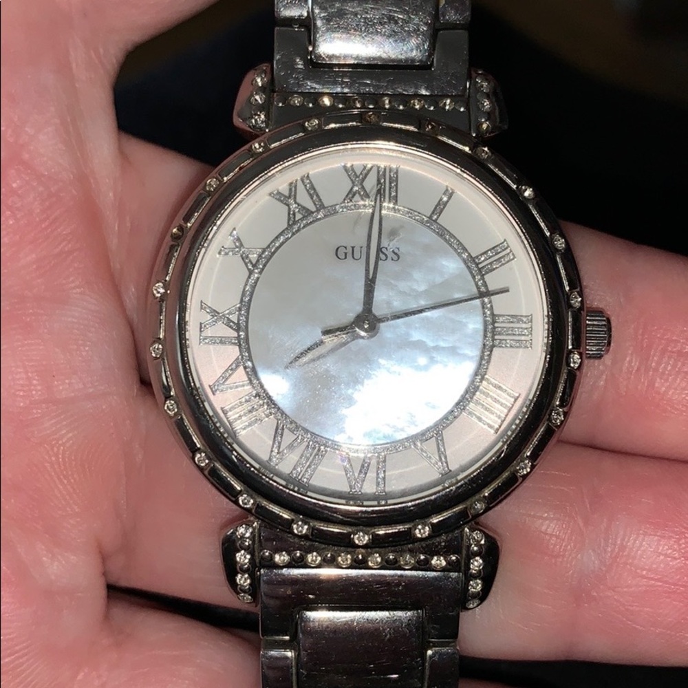 pre-owned women's guess watch
